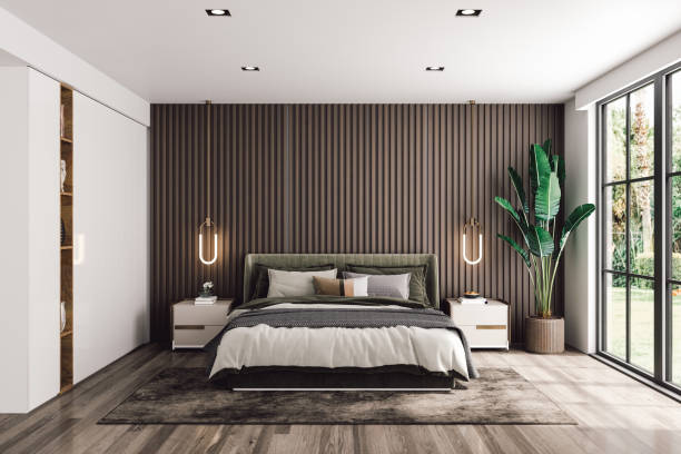 interior of a modern luxury bedroom with garden view.